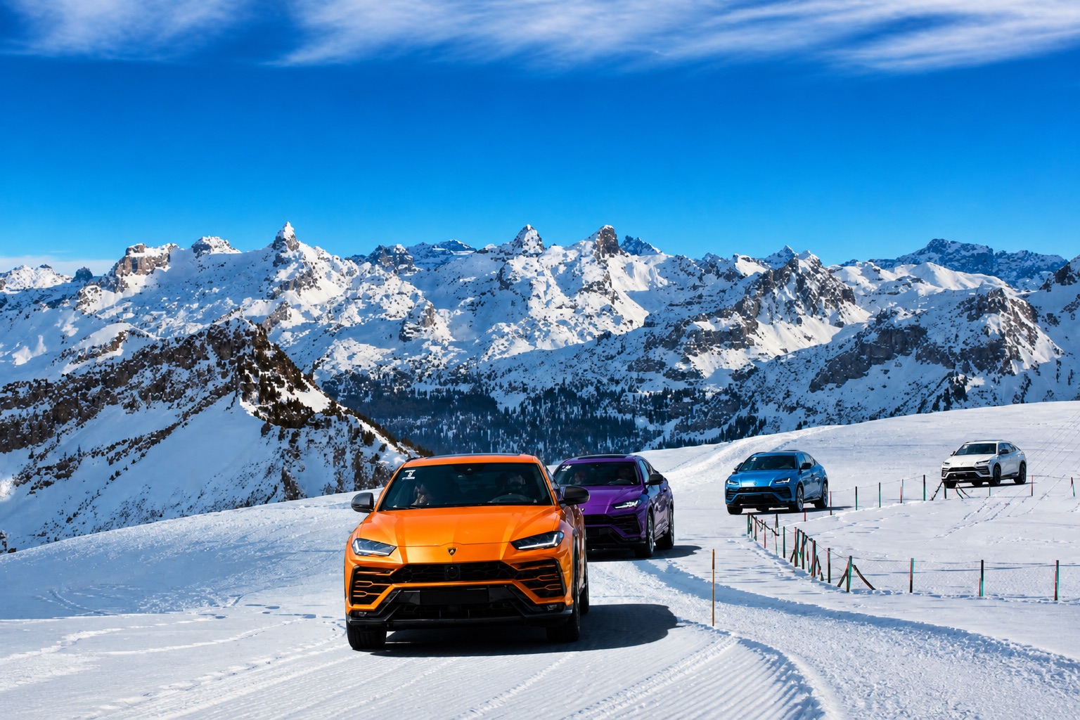Lamborghini Urus convoy in the Dolomites snow